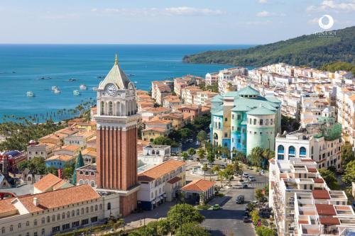 an aerial view of a city with a clock tower at Luna Sol Villas - Dedicated Care Until Check Out in Phu Quoc