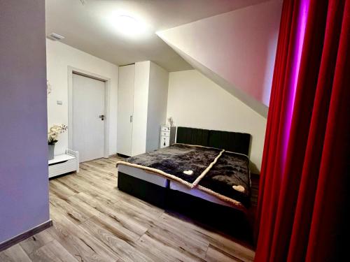 Кровать или кровати в номере Sala Gracja