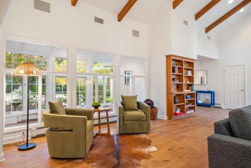 a living room with two chairs and a table at G2N - G2 North Vineyard in Paso Robles