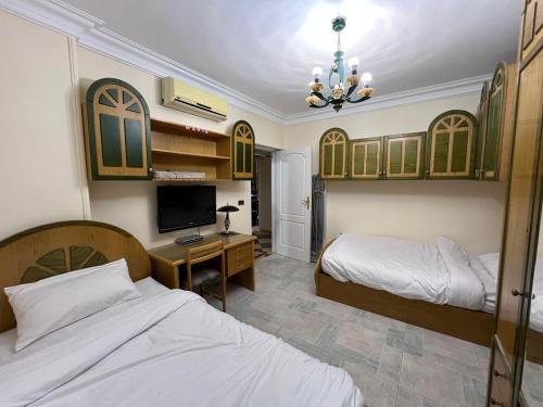 Ένα ή περισσότερα κρεβάτια σε δωμάτιο στο 3 Bedroom apartment with Garden & Office