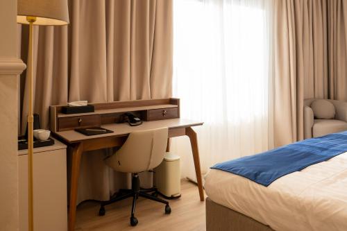 Postel nebo postele na pokoji v ubytování Le Blanc Cotroceni Hotel