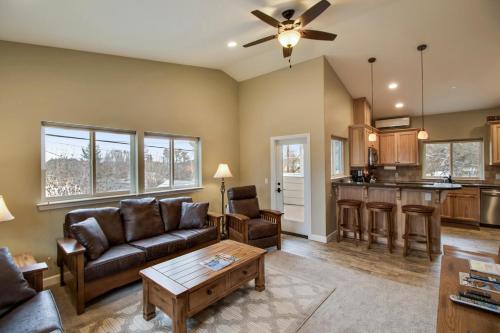 a living room with a couch and a table at Olive Alley in Paso Robles