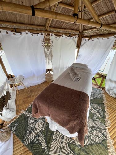 Ένα ή περισσότερα κρεβάτια σε δωμάτιο στο Villa O'Mangos hibiscus