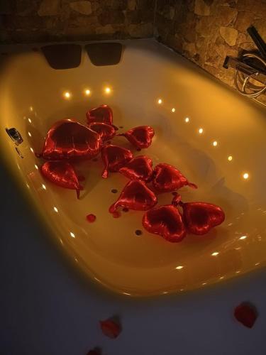 a plate of lobster on a table with lights at Le 10&10 SPA idromassaggio in camera Nepi VT in Nepi