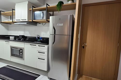 Η κουζίνα ή μικρή κουζίνα στο Apartamento Moderno com Vista em Excelente Localização