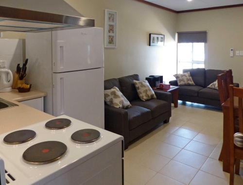 Dapur atau dapur kecil di The Cocos Padang Lodge