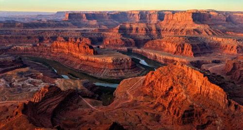 a view of the grand canyon at sunset at Downtown Hideaway in the Heart of Moab in Moab