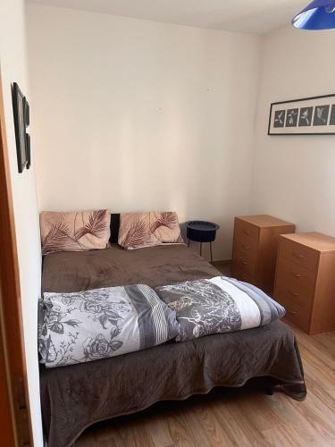 Posteľ alebo postele v izbe v ubytovaní Apartments Bratislava