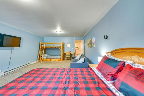 a bedroom with a bed and a couch at Private Hot Tub and Mtn Views Garden Valley Apt! in Crouch