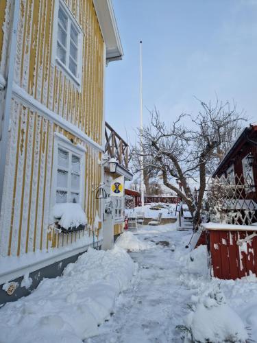 Gårdshotell Klockargården Öregrund v zimě
