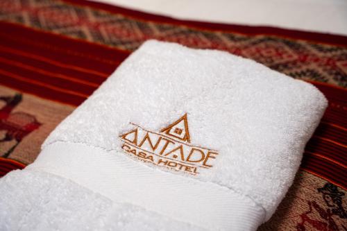 a close up of a white towel on a table at Casa Antade Cusco in Cusco