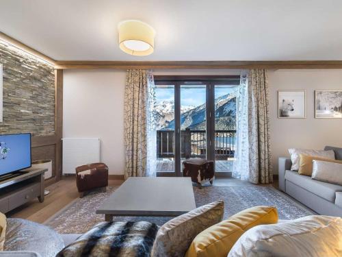 Appartement 4 pièces avec balcon, à 100m des pistes, centre Courchevel Village - FR-1-562-19