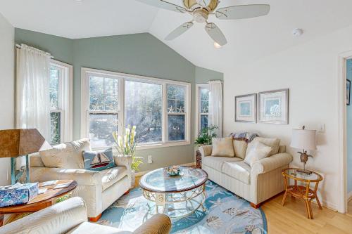 a living room with a couch and a table at Savannahs Landing --- 10 Mary Elizabeth Dr in Ocean View