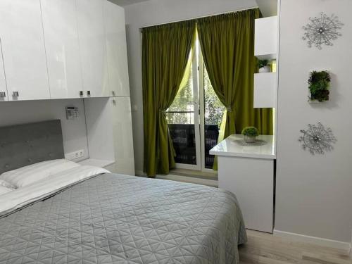 Η κουζίνα ή μικρή κουζίνα στο Verdana apartament