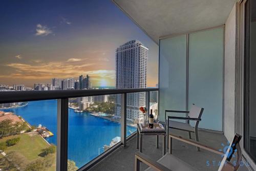 an apartment balcony with a view of the city at Amazing Balcony Near Beach in Hallandale Beach