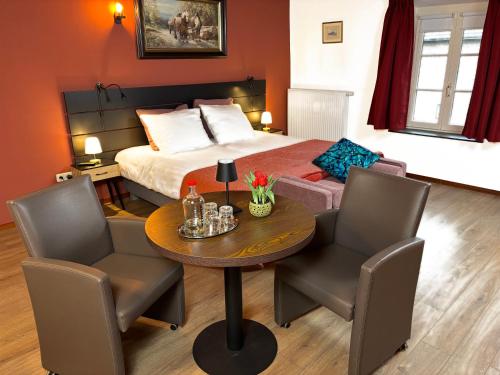 Posezení v ubytování B&B en Vakantiewoningen 't Wienhoes
