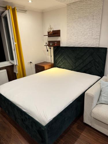 Postel nebo postele na pokoji v ubytování Útulný apartmán v centre mesta