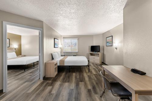 Ένα ή περισσότερα κρεβάτια σε δωμάτιο στο Birch Hill Suites Columbia