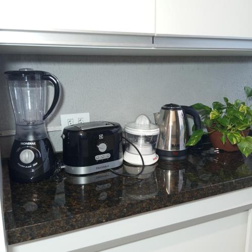 Dapur atau dapur kecil di Próxima a UEM