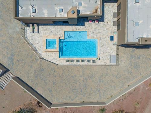 an aerial view of a house with a swimming pool at Eagles Lair, Poolside Luxury! in Parker