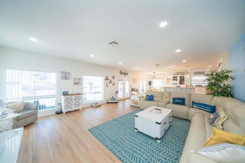 a living room with a couch and a table at Ohana Beach, Paradise Escape in Parker