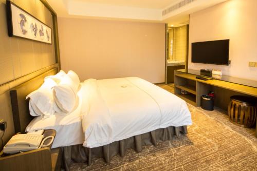 Μια τηλεόραση ή/και κέντρο ψυχαγωγίας στο lnsail Hotel Shenzhen Luohu Port Railway Station