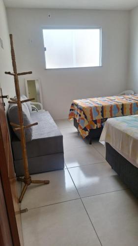 Katil atau katil-katil dalam bilik di AP BAIRRO de FÁTIMA Familiar