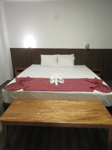 Letto o letti in una camera di Rivo Ohia Inn