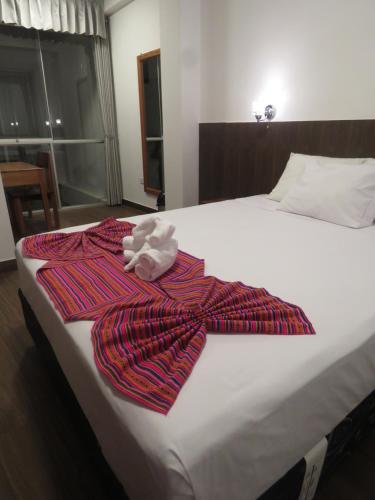 Letto o letti in una camera di Rivo Ohia Inn