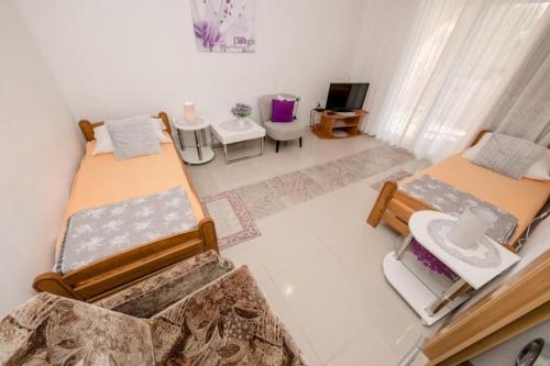 Apartments with parking space Barbat, Rab - 23817
