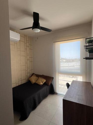 Katil atau katil-katil dalam bilik di Modern and equipped apartment