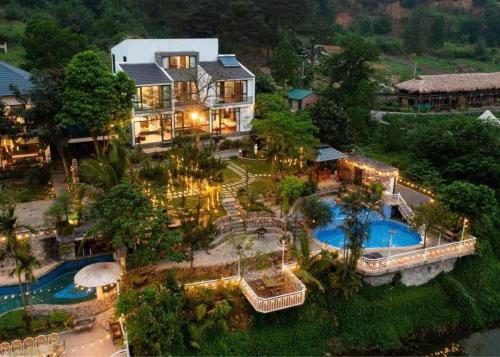 an aerial view of a large house with a swimming pool at Lavita villa Resort in Sóc Sơn