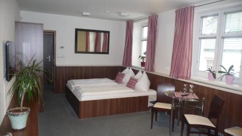 Postel nebo postele na pokoji v ubytování Graphic Hotel