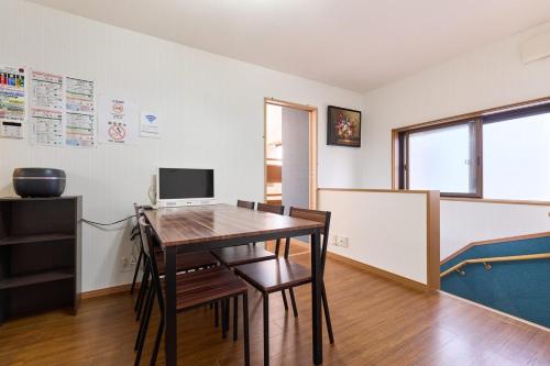 a room with a desk with a computer on a table at 2LDK Quiet area Free parking space 6min from station in Tokyo