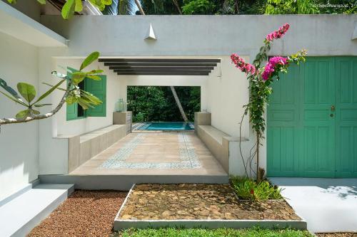 Κήπος έξω από το Tropical Allure by Tequila Holidays