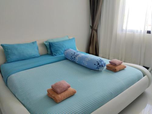 En eller flere senge i et værelse på Luxury spacious 3 bdr apartment Pandora residence