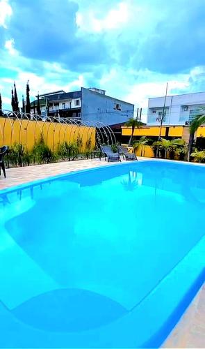 Bazén v ubytování Refúgio Família Rossett em Itapoá - Casa fantástica c piscina p 18 pessoas nebo v jeho okolí