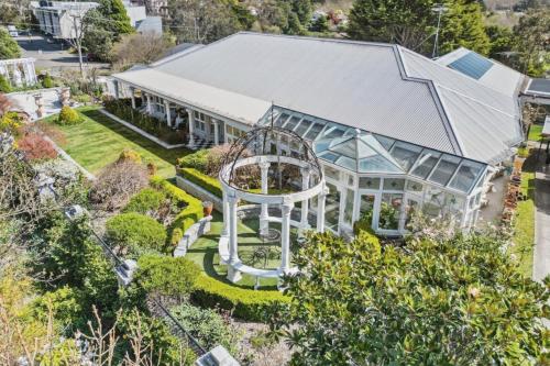 an aerial view of a house with a playground at Katoomba Estate in Katoomba