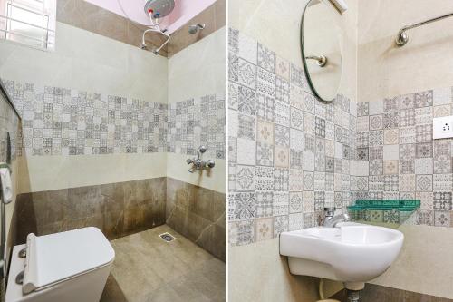 a bathroom with a toilet and a sink at Fabhotel Hathvik Park - Near to Nandanam Metro Station in Chennai