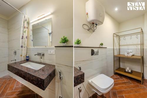 ein Badezimmer mit Waschbecken und Toilette in der Unterkunft StayVista at Sundale Apartment with Heater & WiFi in Varanasi