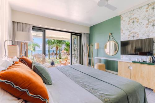 Veranda Paul et Virginie Hotel & Spa - Adults Onlyにあるテレビまたはエンターテインメントセンター