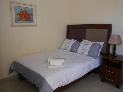 Ένα ή περισσότερα κρεβάτια σε δωμάτιο στο Bed and breakfast Newlife BNB