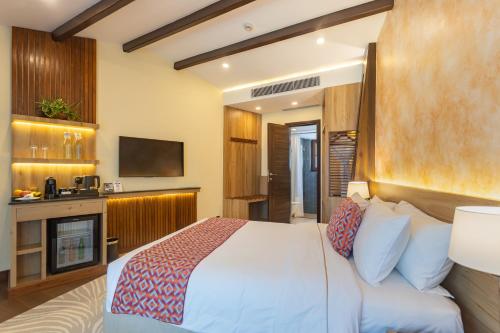 Ein Bett oder Betten in einem Zimmer der Unterkunft Fish Tail Lodge