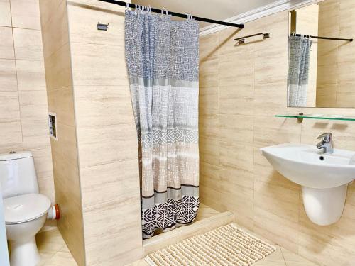 A bathroom at Apartments in complex ATIA RESORT