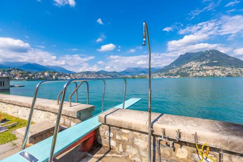 a view of the water with mountains in the background at La Perla Sul Lago - Happy Rentals in Paradiso