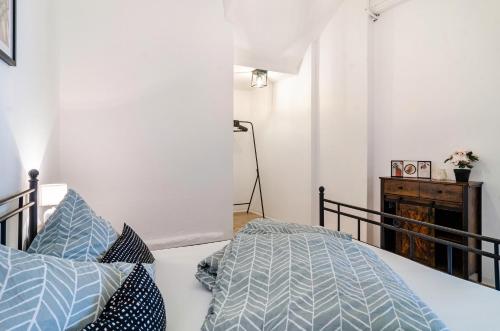 Postel nebo postele na pokoji v ubytování Mäxle's Loft Winzeln