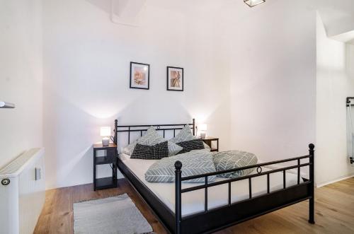 Postel nebo postele na pokoji v ubytování Mäxle's Loft Winzeln