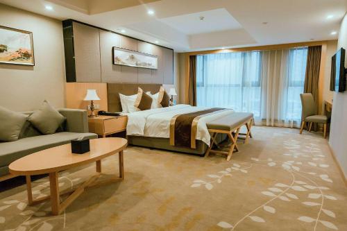 Ένα ή περισσότερα κρεβάτια σε δωμάτιο στο Days Inn by Wyndham Business Place Sichuan Bazhong