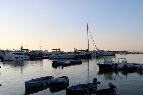 a group of boats are docked in a harbor at MaryGrace B&B in Castellammare di Stabia