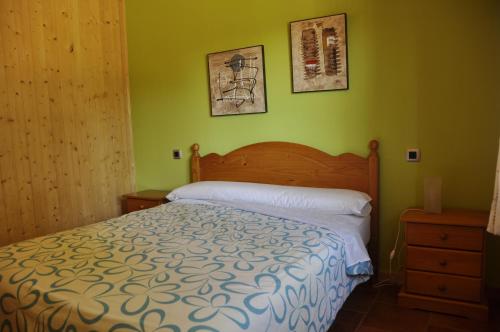 Giường trong phòng chung tại Cabañas Rurales Los Barrancos